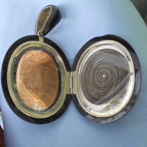 A loved one’s hair was often placed inside of a mourning locket. (Courtesy of www.ArtofMourning.com)
